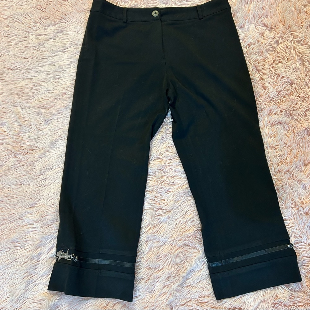 Absolu  Capri black pants with metallic hardware on the bottom. Size Large.